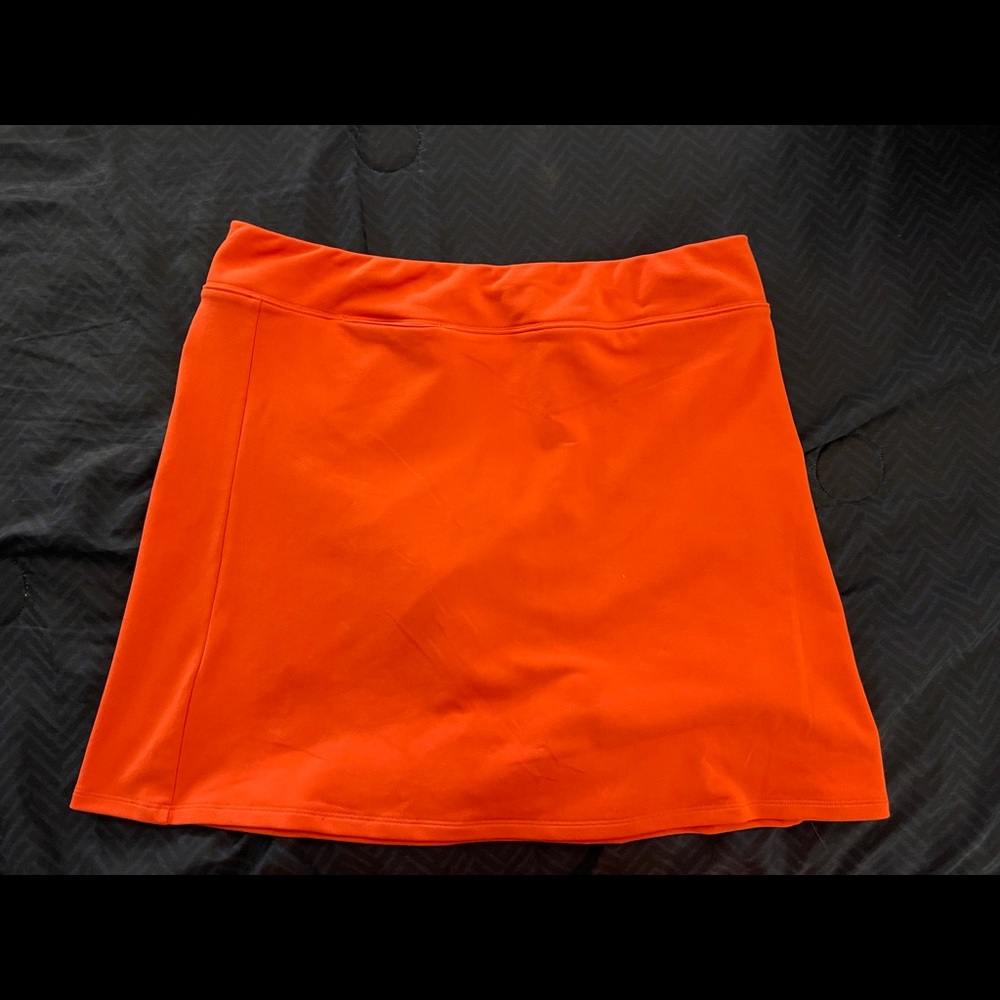 Adidas coral Climalite golf skort.